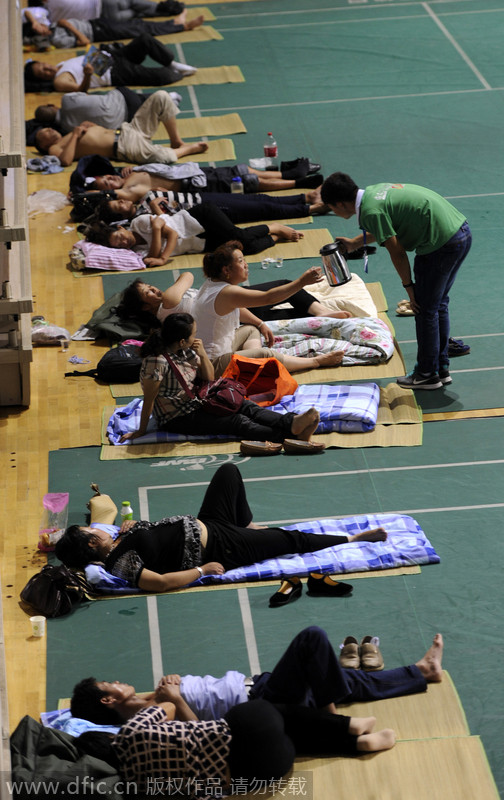 Parents rough it out in stadium for children