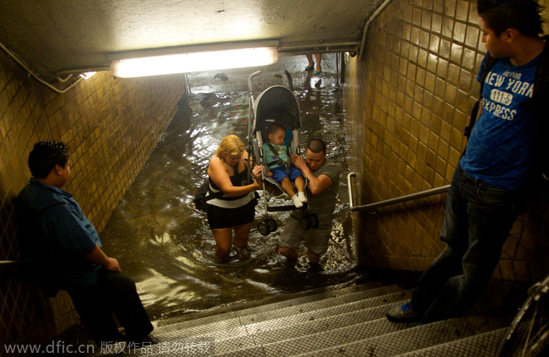 Heavy rain, floods swamp NYC metro stations