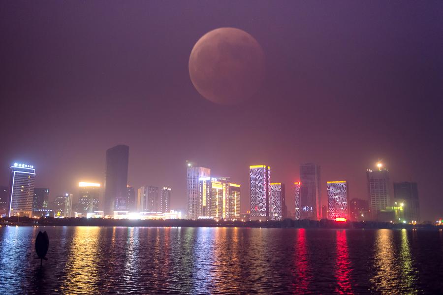 Lunar eclipse in Asia and the Americas