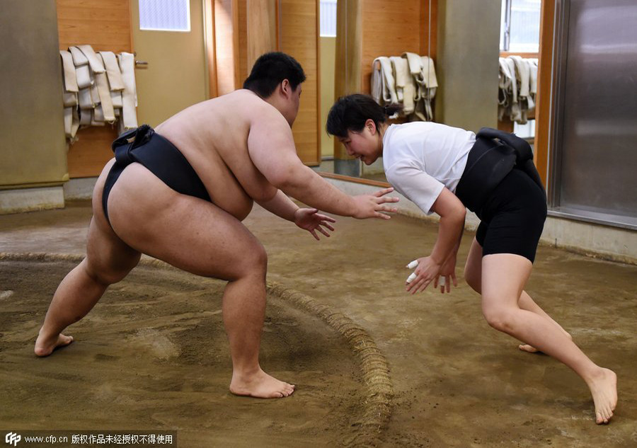 Japan's women wrestlers take on sumo's big boys