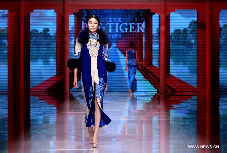 Qipaos sizzle on the runway as China Fashion Week kicks off