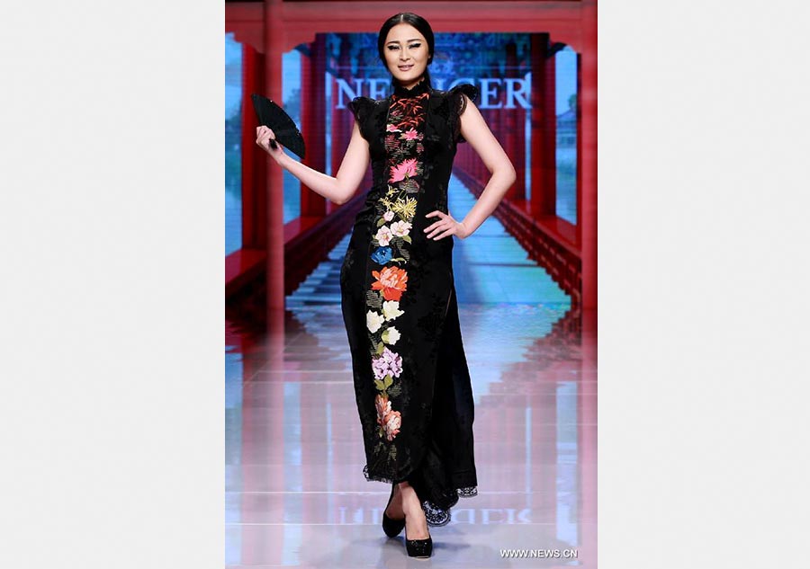 Qipaos sizzle on the runway as China Fashion Week kicks off