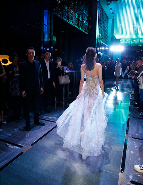 Models present creations at W Beijing's fashion wedding show