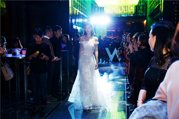 Models present creations at W Beijing's fashion wedding show