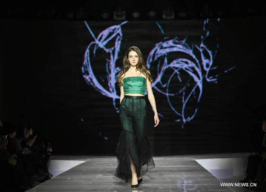 Models display Grace Chen's creations in Beijing