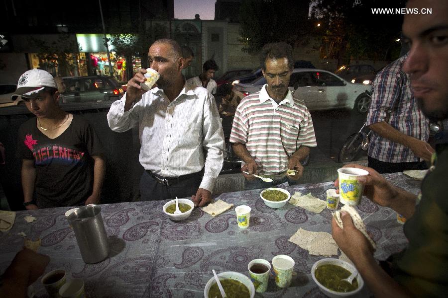 Muslims break their fast during month of Ramadan