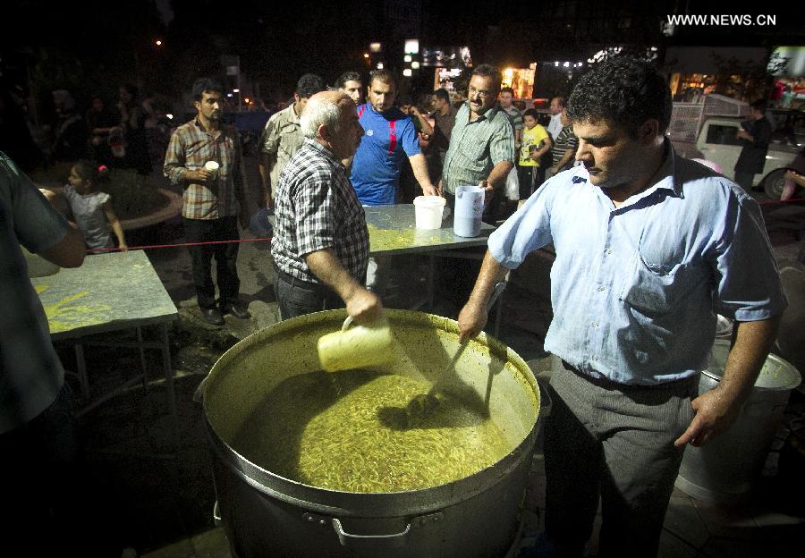 Muslims break their fast during month of Ramadan