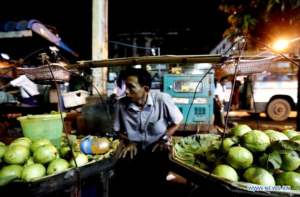 Fruit sellers at roadside in Yangon