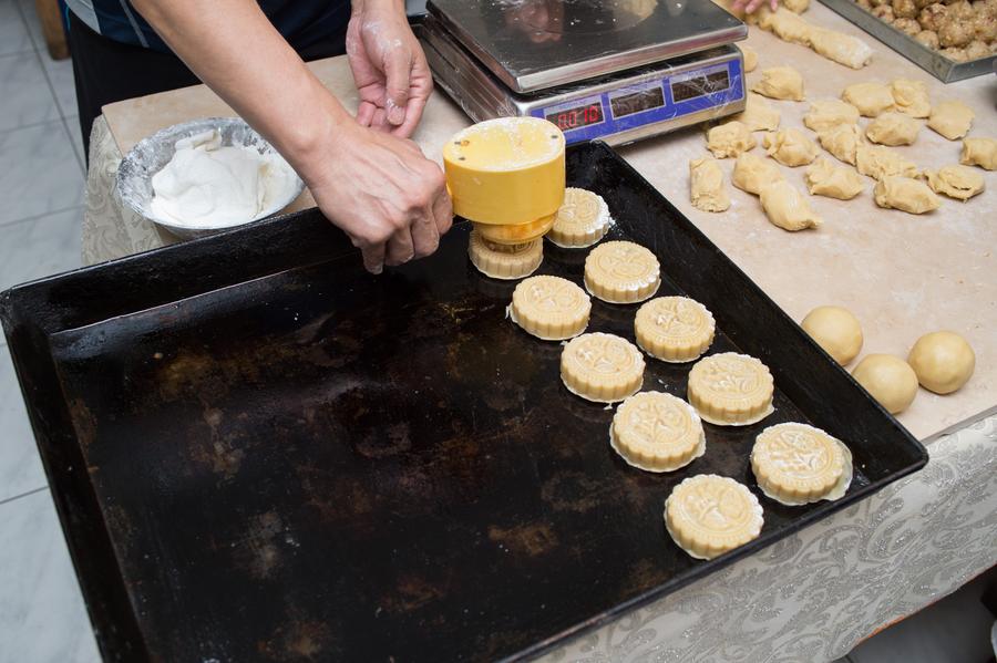 Pastry cooks make mooncakes in Cairo, Egypt