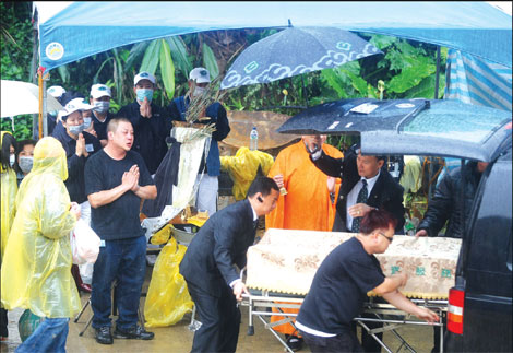 Four bodies found in landslide rubble