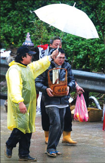 Four bodies found in landslide rubble