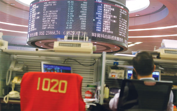 HK stocks slide for second day on currency concerns