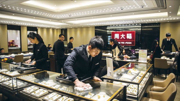 HK jewelry giant takes hit from slowdown