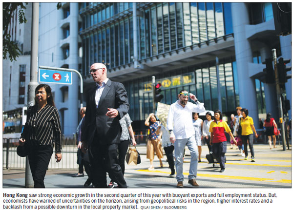 'Black swans' warning as HK economy lifts
