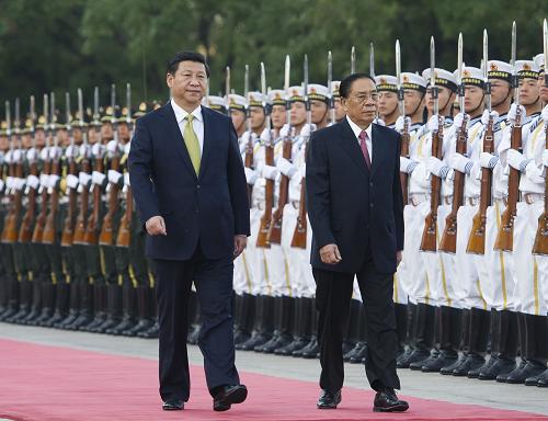 习近平同老挝人革党中央总书记、国家主席朱马里会谈