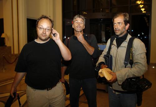 组图：在利比亚被捕法新社和盖蒂图片社3名记者获释