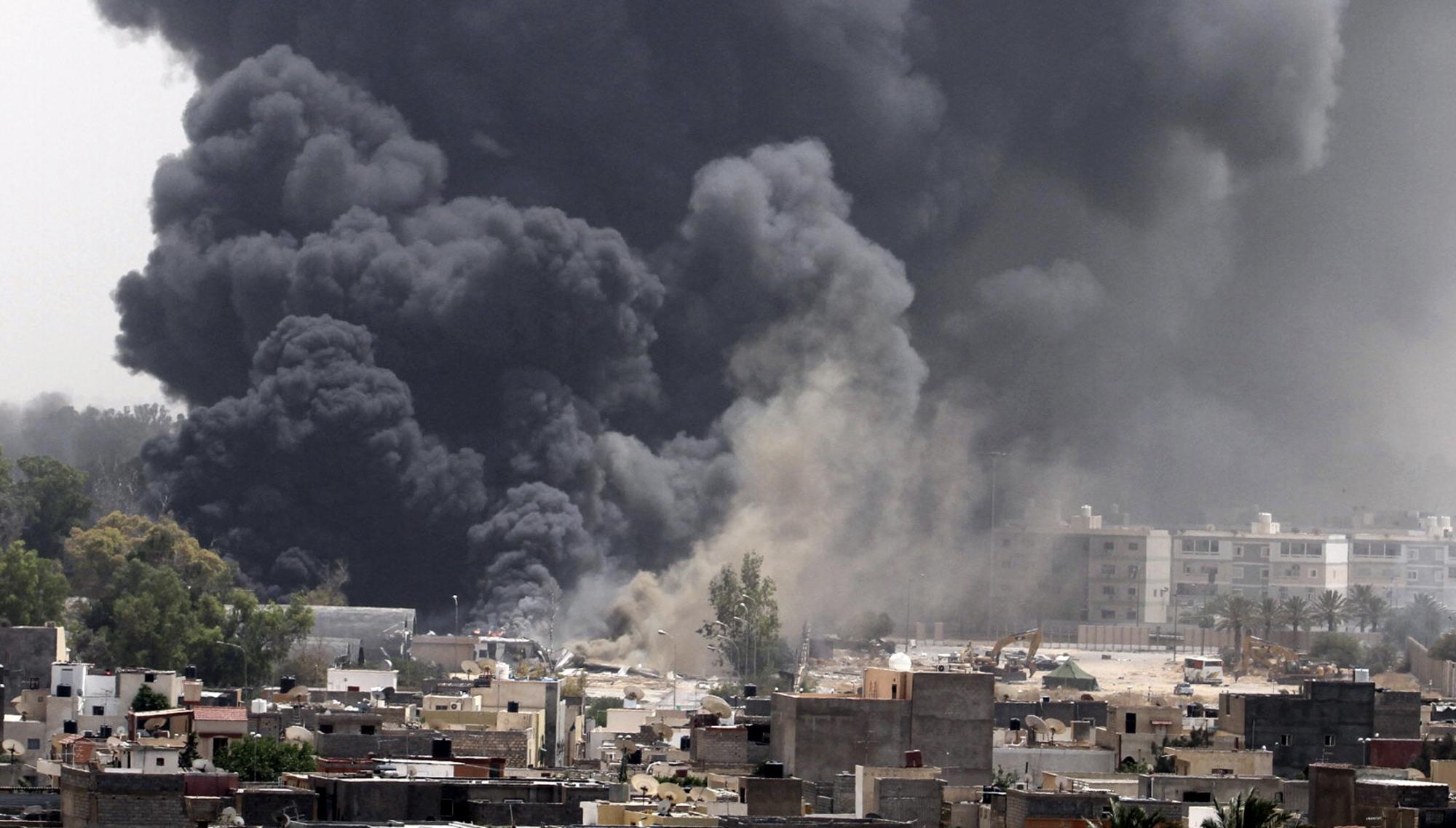 北约密集轰炸利比亚 卡扎菲誓言血战到底子女助阵