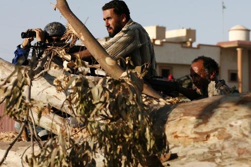 利比亚政府军猛攻叛军据点 北约称卡扎菲时日无多