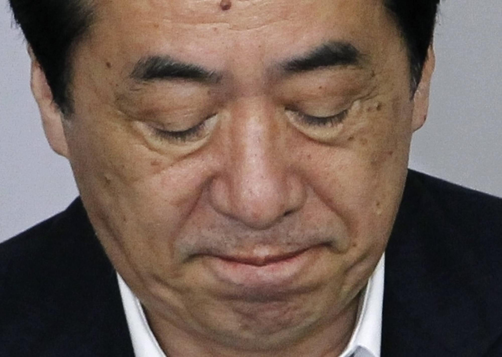 苦撑一年三个月 “拖延首相”菅直人正式辞职