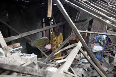 印尼强震死者人数上升至57人 2万多幢建筑受损