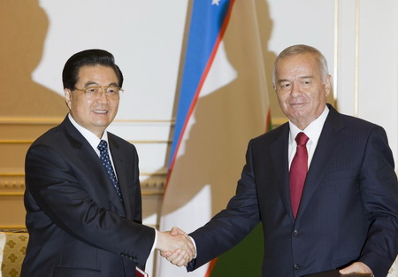 President Hu in Uzbekistan for visit, SCO summit