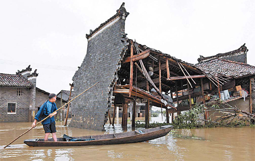 Death toll in deluge hits 199