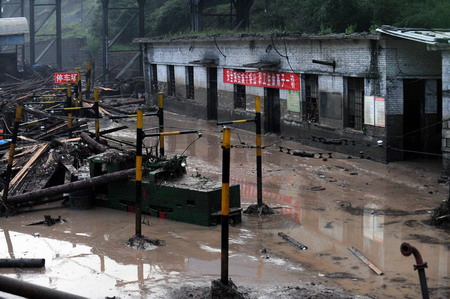 Coal mine flood traps 9, eight confirmed alive