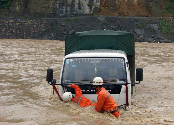 12,000 evacuated as floods wreck havoc in SW China