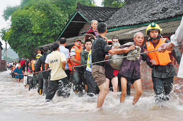 Floods leave at least 34 dead, 87 missing