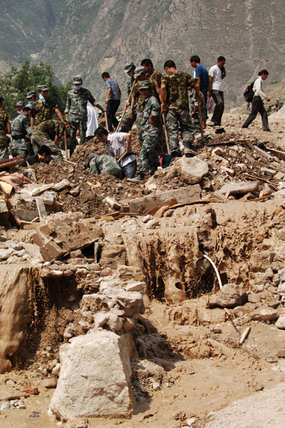 Aid, supplies pour into mudslide-flattened Zhouqu
