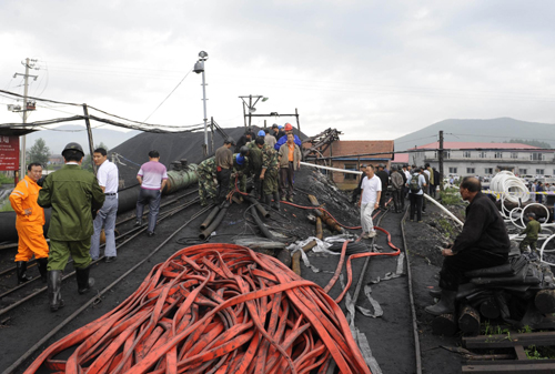 18 trapped in NE China flooded coal mine