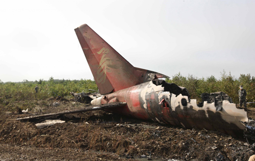 China probes plane crash, orders safety checks