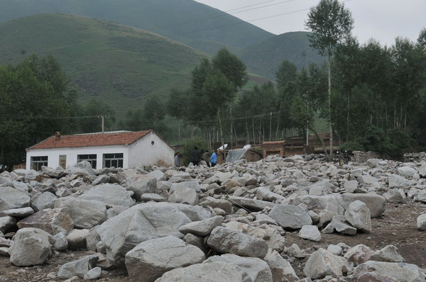 Heavy rain left 12 dead in NW China