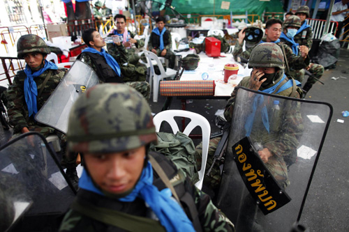 Peace returns to Bangkok, but trouble looms