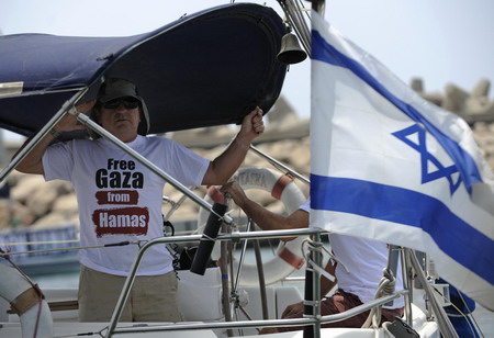 Israeli ships stalk pro-Palestinian aid flotilla