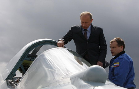 Putin attends test flight of Russia's new fighter