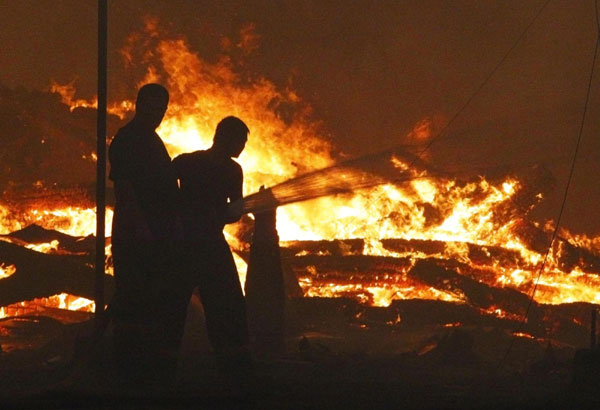 Forest fires spread through Central Russia