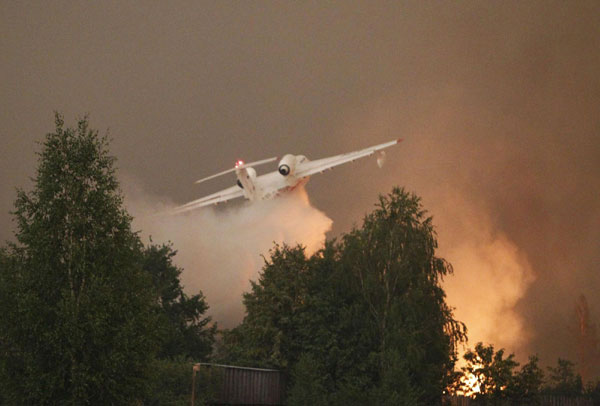 Forest fires spread through Central Russia