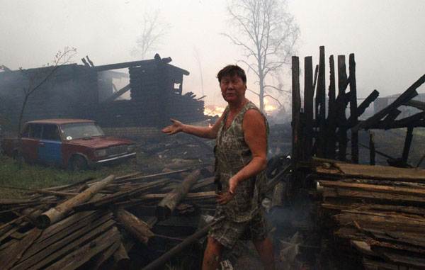 Forest fires spread through Central Russia