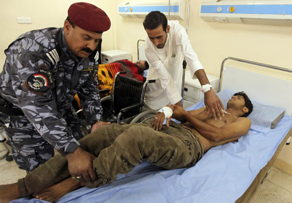 Baghdad suicide bomb hits army recruits, kills 61
