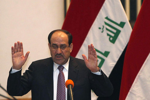 Iraq approves new government with Maliki as PM