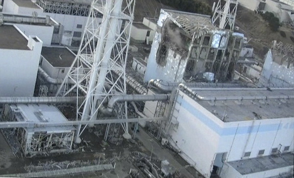 Japan hopes to restore power at 2 crippled reactors