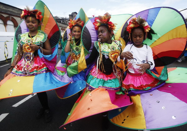 London embraces carnival 3 weeks after riots