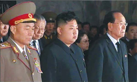 Kim Jong-il lies in state as son leads mourning