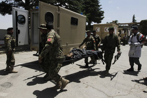 18 dead after Afghan hotel siege