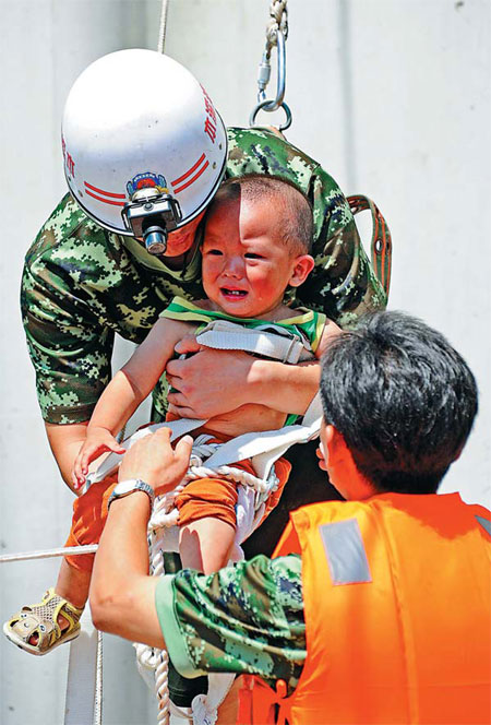 Rains spawn deadly floods, mudslide