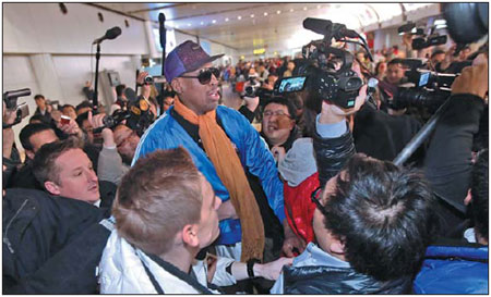 Emotional Rodman apologizes on return from DPRK