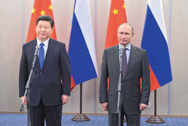Xi, Putin vow stronger ties