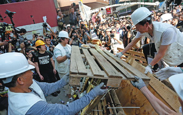 Hong Kong officers clear portion of street