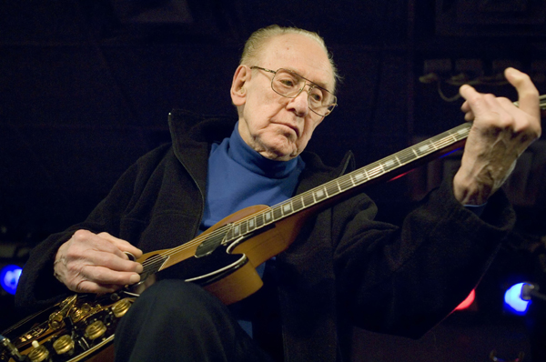 Guitar legend strums on at 100